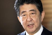 Japan's Prime Minister Shinzo Abe speaks to the media