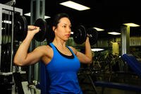 A Coastie goes through her exercise routine.