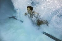 A Marine recruit conducts swim qualification.
