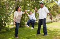 Family playing in a park