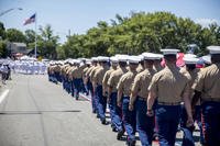 Marines attached to the USS Arlington march through the streets of Bristol, Rhode Island during the town’s annual Fourth of July Parade, July 4, 2016. (U.S. Marine Corps photo/Cpl. Dalton A. Precht)