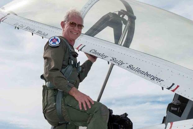 Former airline pilot Chesley “Sully” Sullenberger III poses for a photo before his flight with the United States Air Force Thunderbirds at Travis Air Force Base. (U.S. Air Force/Louis Briscese)