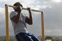 A member of the Pacific Tactical Law Enforcement Team complete a physical fitness test.