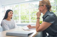 woman interviewing with senior staff