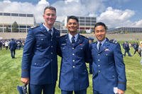 Baseball players Paul Skenes, Sam Kulasingam and Aerik Joe pose in their military uniforms.