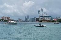 Coast Guard boat turns back boats from the PortMiami channel.