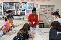 Navy-Marine Corps Relief Society visiting nurse T’Sheira Scott, based in Yokosuka, Japan, teaches a healthy girl interactive workshop. 