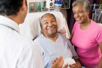 A veteran and his caregiver speak to a doctor. (Image: va.gov)